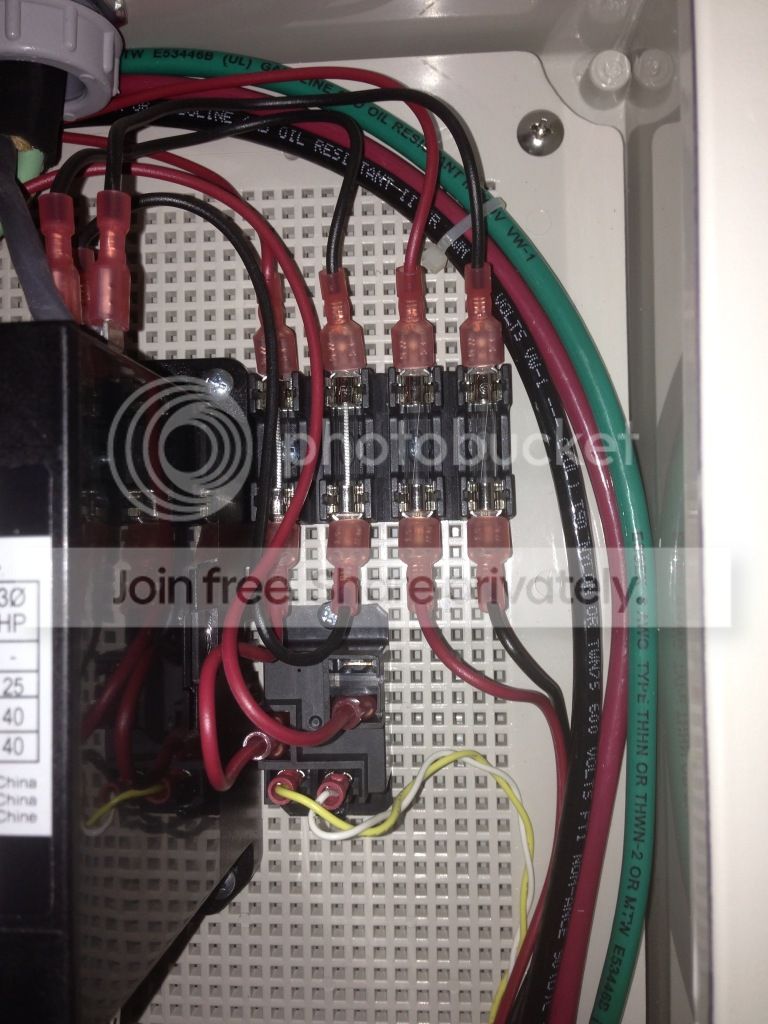 75A OpenEVSE control circuit fusing - left 2 fuses 2A Slow Blow for 240V contactor coil, right 2 1A fastblow for 12VDC OpenEVSE power supply, bottom 12V relay can be seen controlling the 240V contactor coil, Uploaded from the Photobucket iPhone App